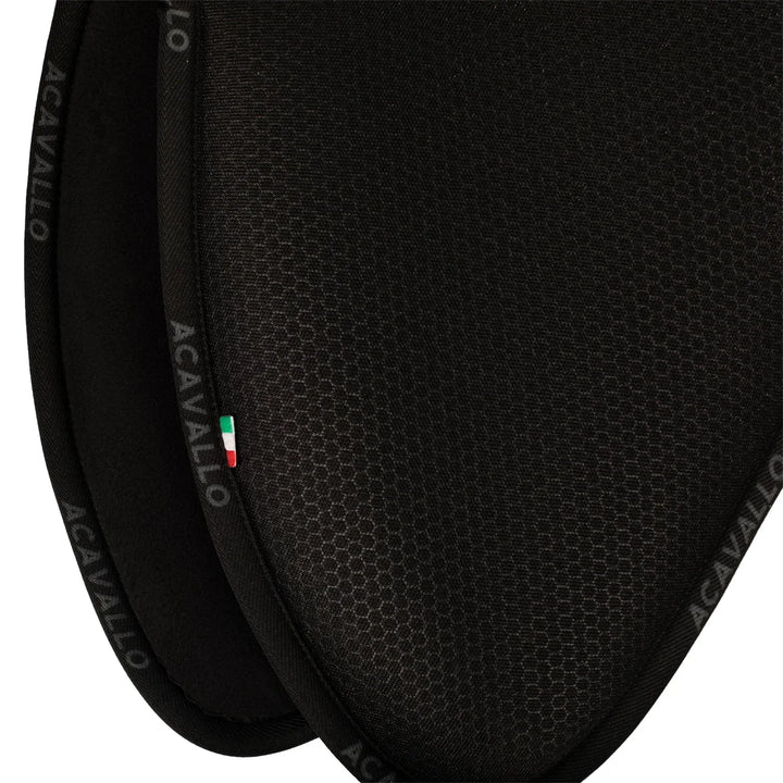 Close-up of a black equestrian saddle with 'Acavallo' branding.